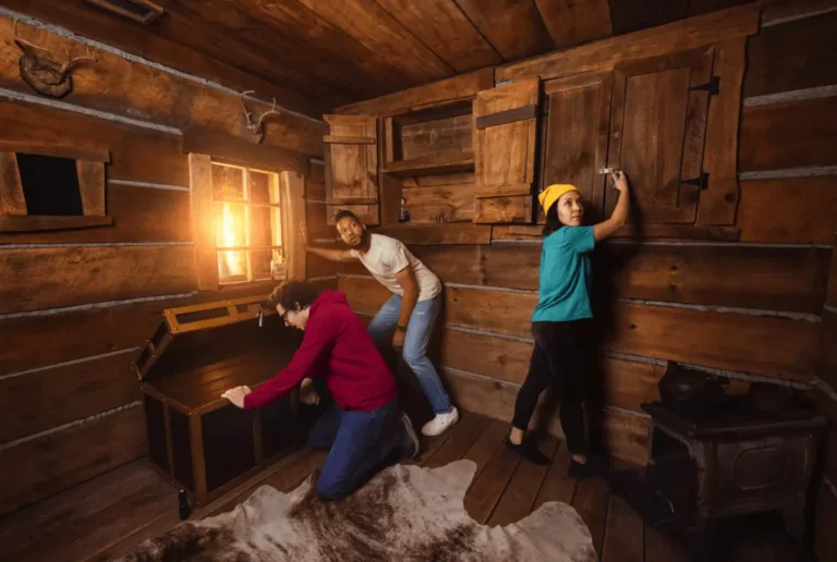 Group of three people finding a way to escape